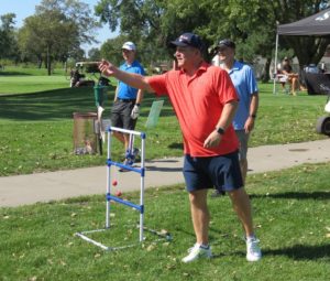 One of our golfers playing a game of Ladderball.